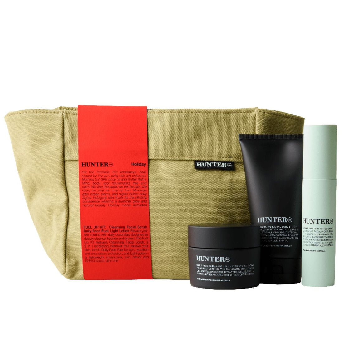 Set of skincare products with a beige tote bag featuring a red label on a white background